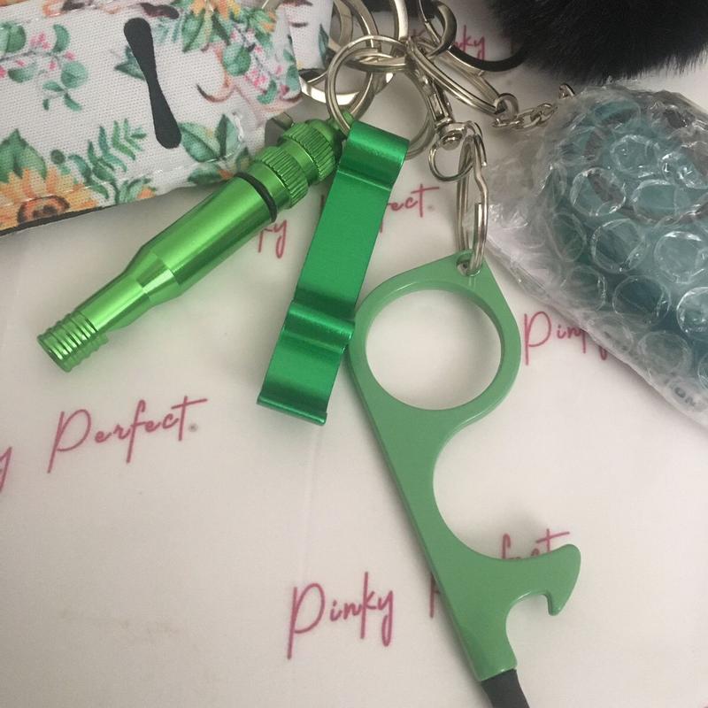 Pinky Perfect UK Legal Green Sunflower Key Chain Set with 3-in-1 Stylus, Door Opener, Bottle Opener, Whistle, Personal Alarm, Light, Wristlet, Sanitiser Pouch, Bottle, Lip Balm Holder, Pom Pom and Car Escape Tool 3